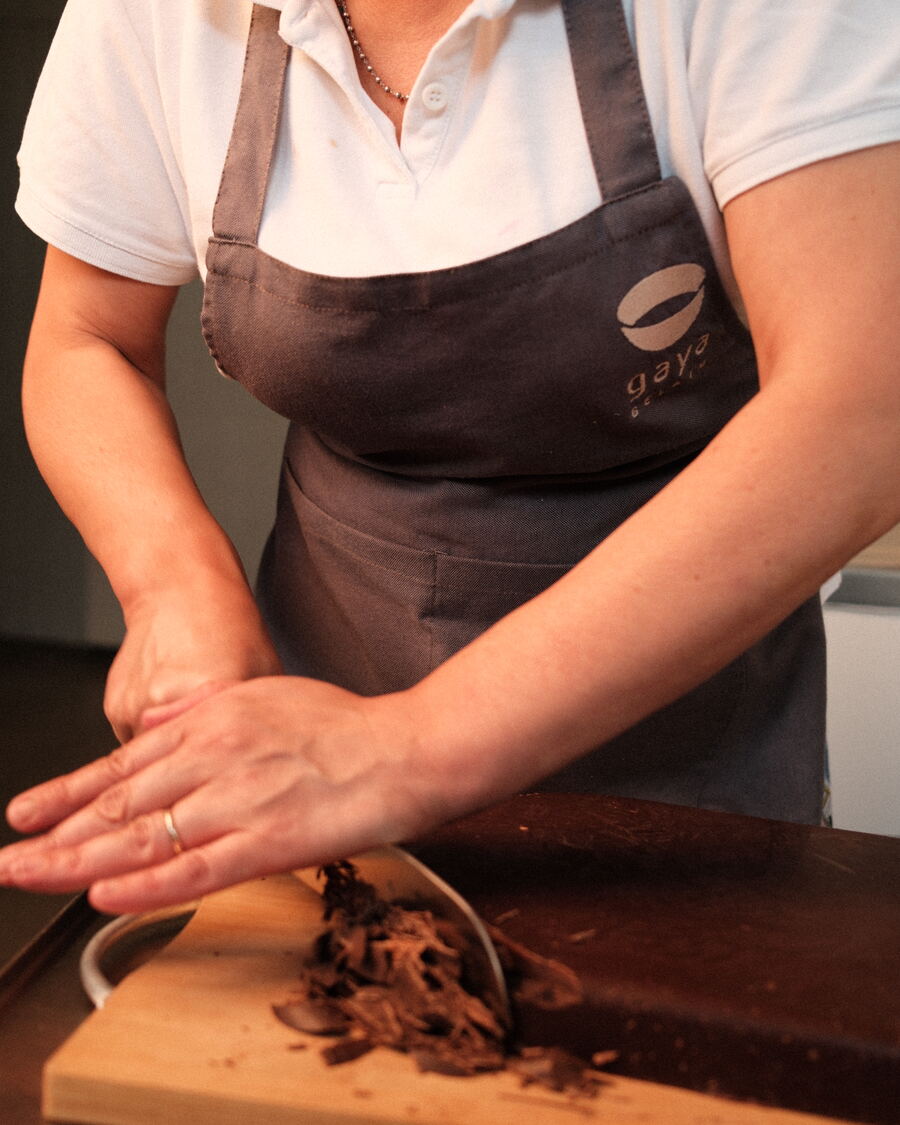 Gaya Gelato chef chopping chocolate
